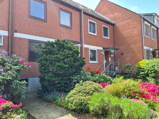 Charmantes Reihenmittelhaus mit idyllischem Garten in attraktiver